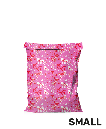 Webshopverpakking roze met strikjes - verzendzak 25x33+7cm