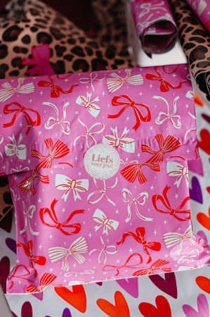 Webshopverpakking roze met strikken - Verzendzak 36x45+5cm