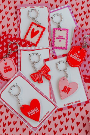 Roze Sleutelhanger hartje met juf in het rood